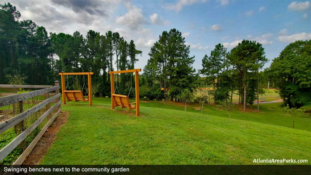 East-Roswell-Park-Fulton-Swinging-bench-seats-next-to-the-Community-Garden