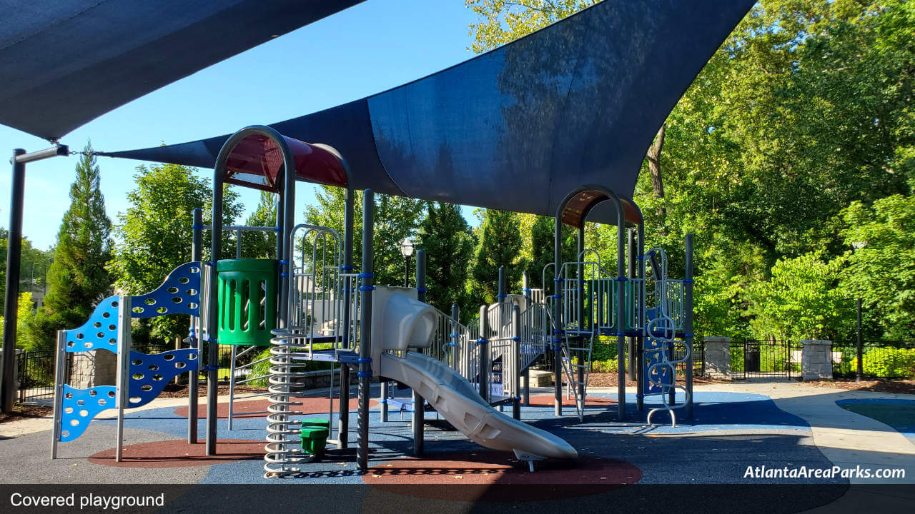 Georgetown Park DeKalb Dunwoody Covered playground with slides and swings