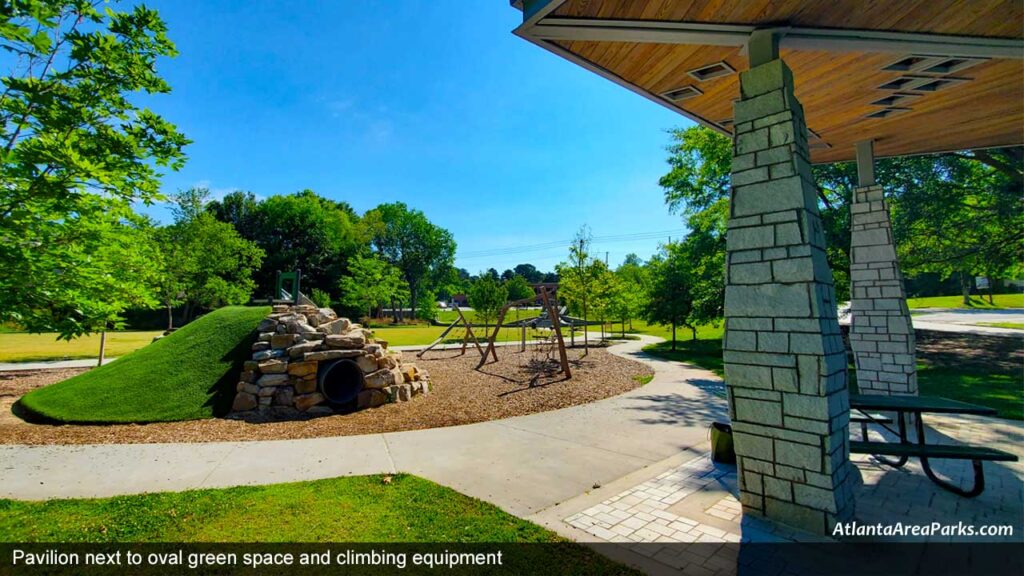 Georgian-Hills-Park-Dekalb-Brookhaven-Pavilion-next-to-oval-green-space-and-climbing-equipment