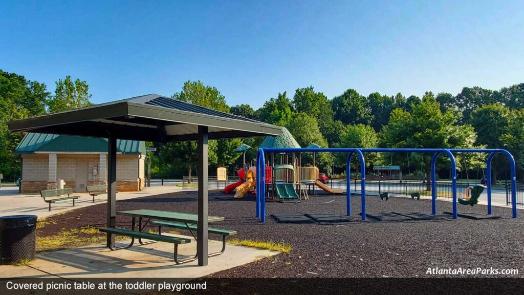 Mason-Mill-Park-Dekalb-Decatur-Covered-picnic-table-at-the-toddler-playground