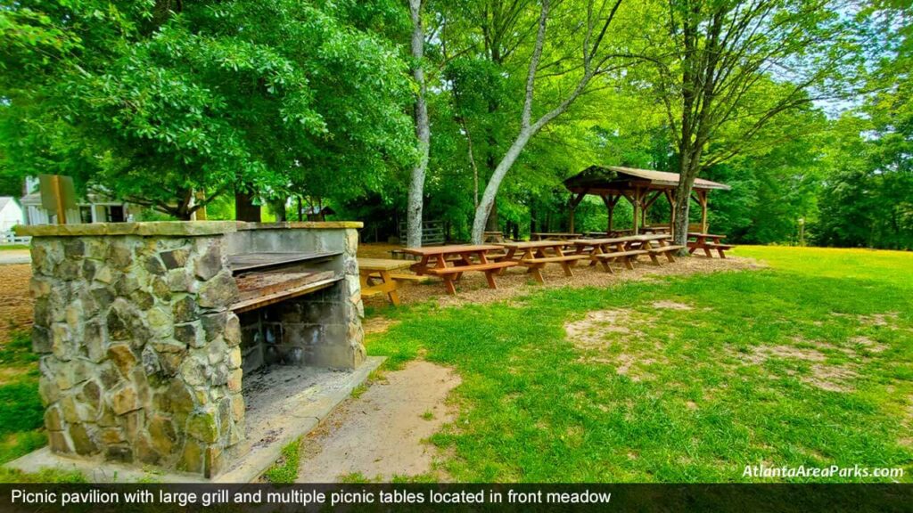 McFarlane-Nature-Park-Cobb-Marietta-Picnic-pavilion-with-large-grill-and-multiple-picnic-tables-located-in-front-meadow