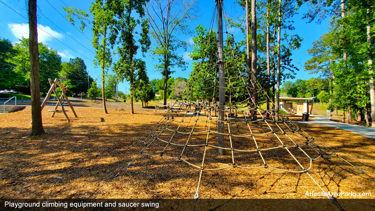 Skyland-Park-Dekalb-Brookhaven-Playground-climbing-equipment-and-saucer-swing